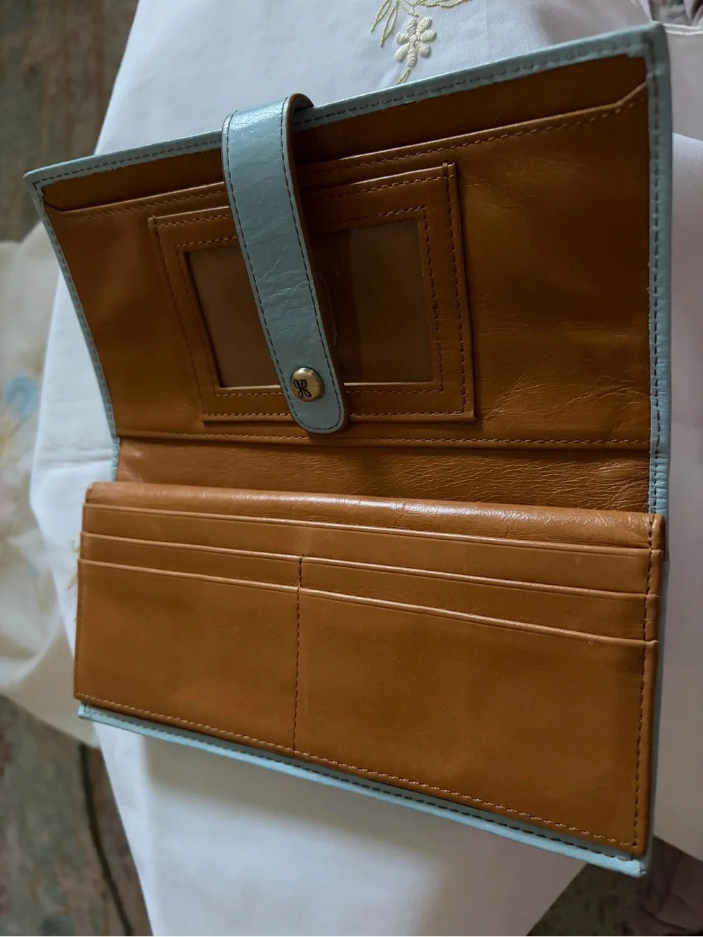 HOBO light blue leather wallet with brass hardware